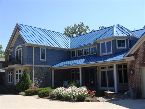 house white siding blue door metal roof|blue roof house.